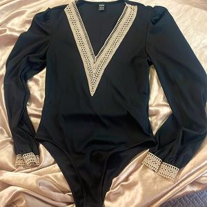 Black and gold bodysuit